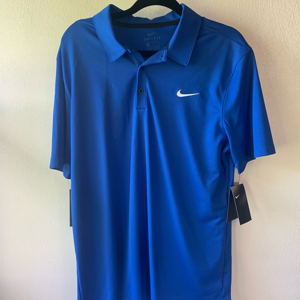 NWT. Men’s drifit Nike golf shirt.